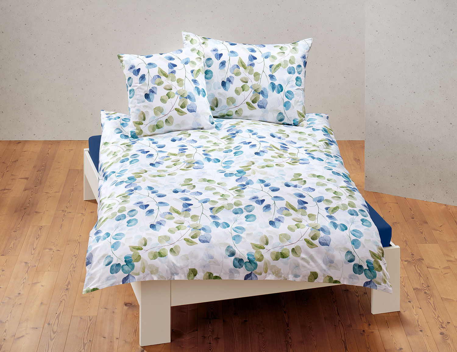Bettwäsche mit grün-blauem Blattmuster
