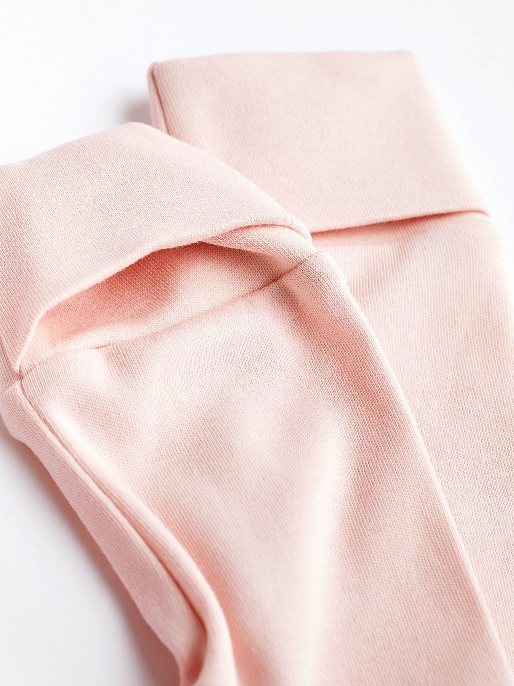 Roze/wit - Babypyjama's (0-2 jr)