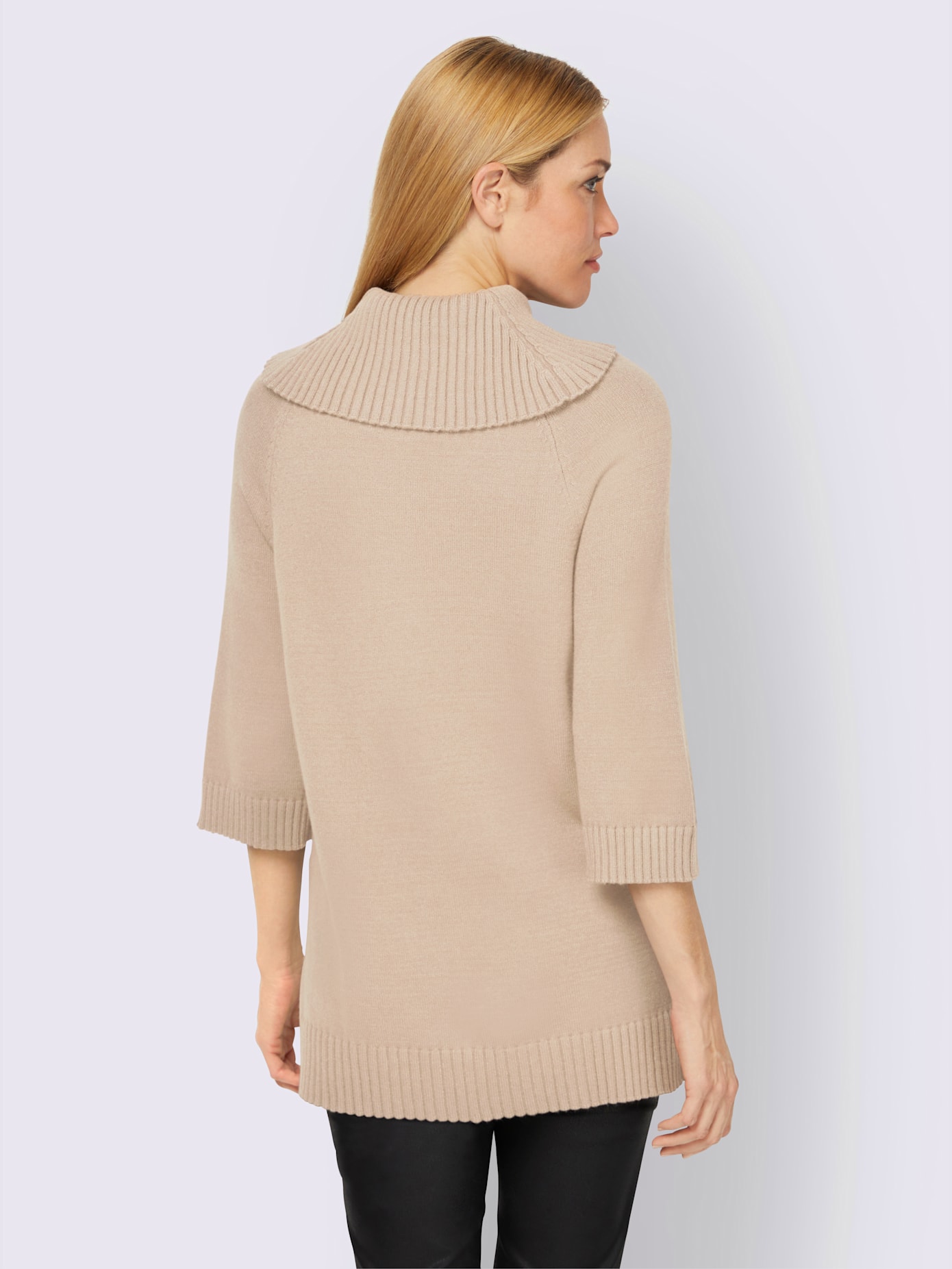 Pull à col roulé plus long au dos