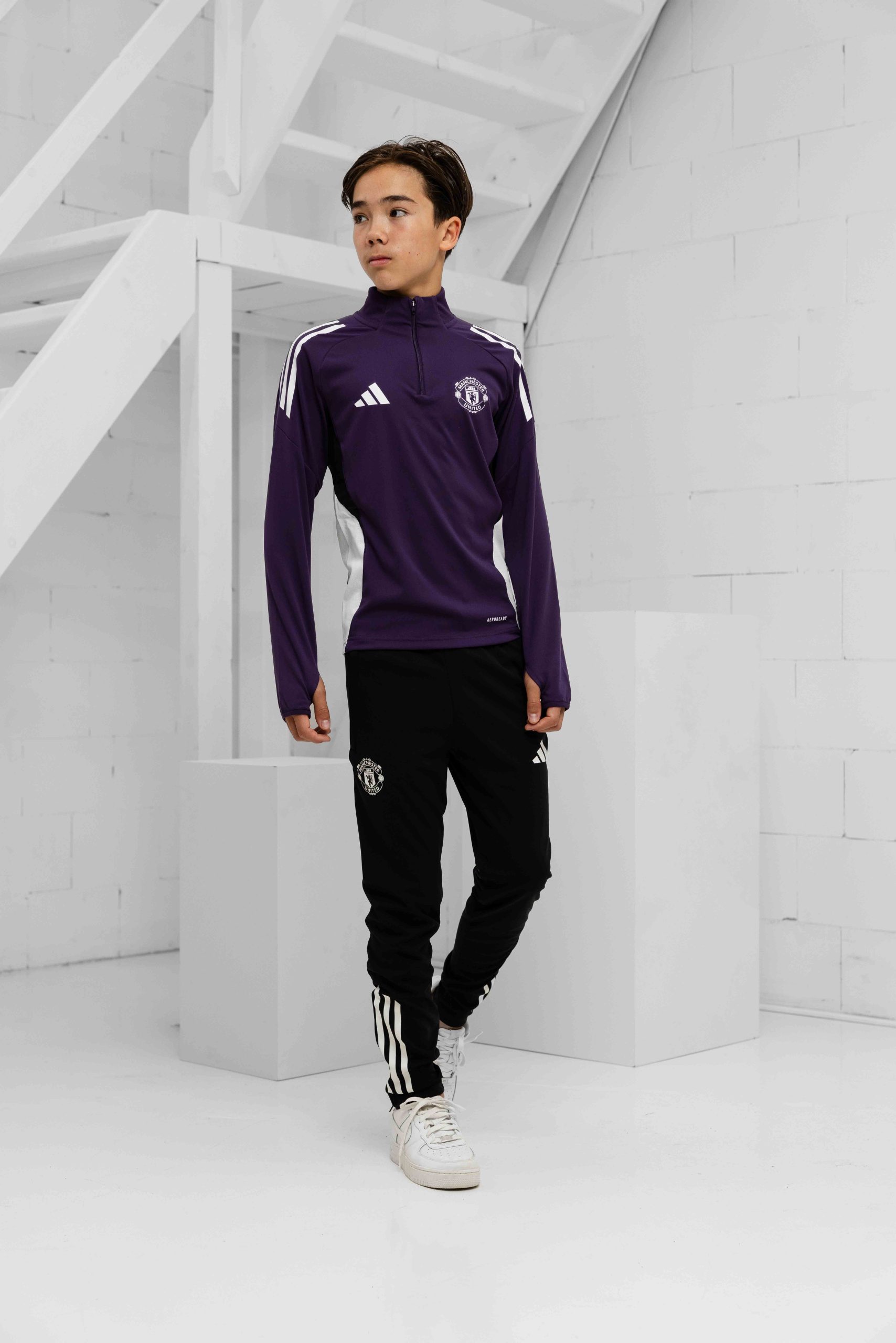 Manchester United 1/4 Zip Trainingspak Junior 2025/2026