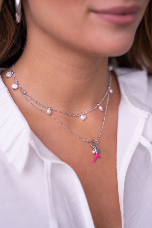 Minimalistische ketting met bolletjes en parels