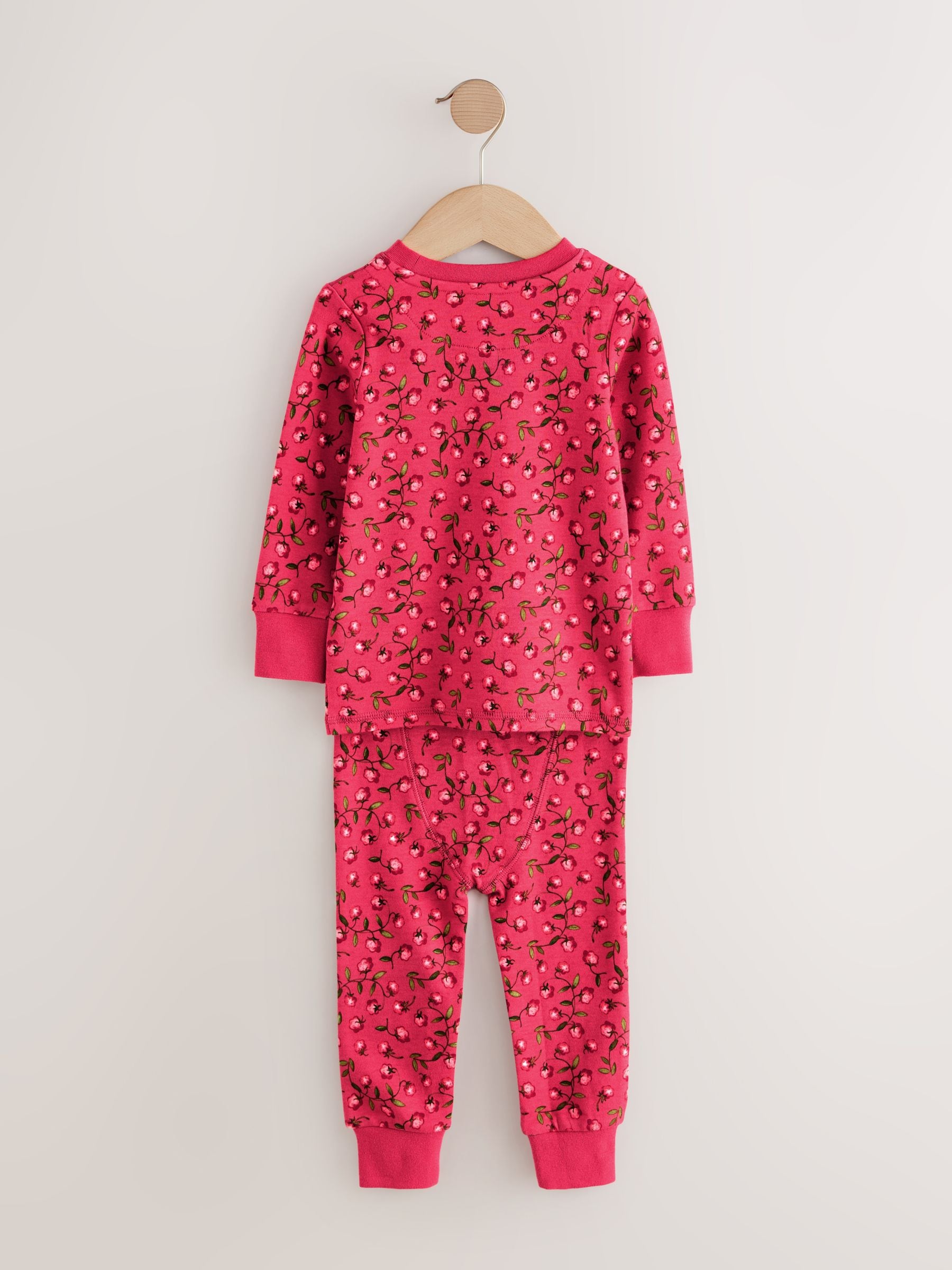 Rood/roze bloemenapplicatie - Verpakking van 3 knusse pyjama's (9 mnd-9 jr)