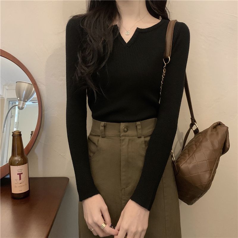 Closette - Gebreide top met lange mouwen en open knoopsluiting