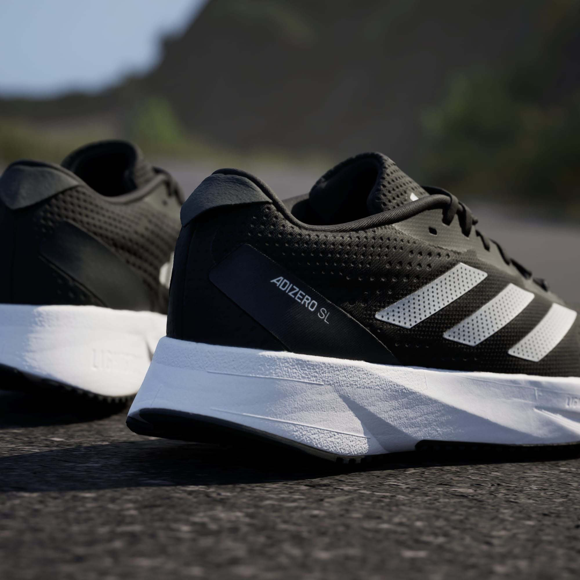 Adizero SL Dame Core Black/Cloud White/Carbon