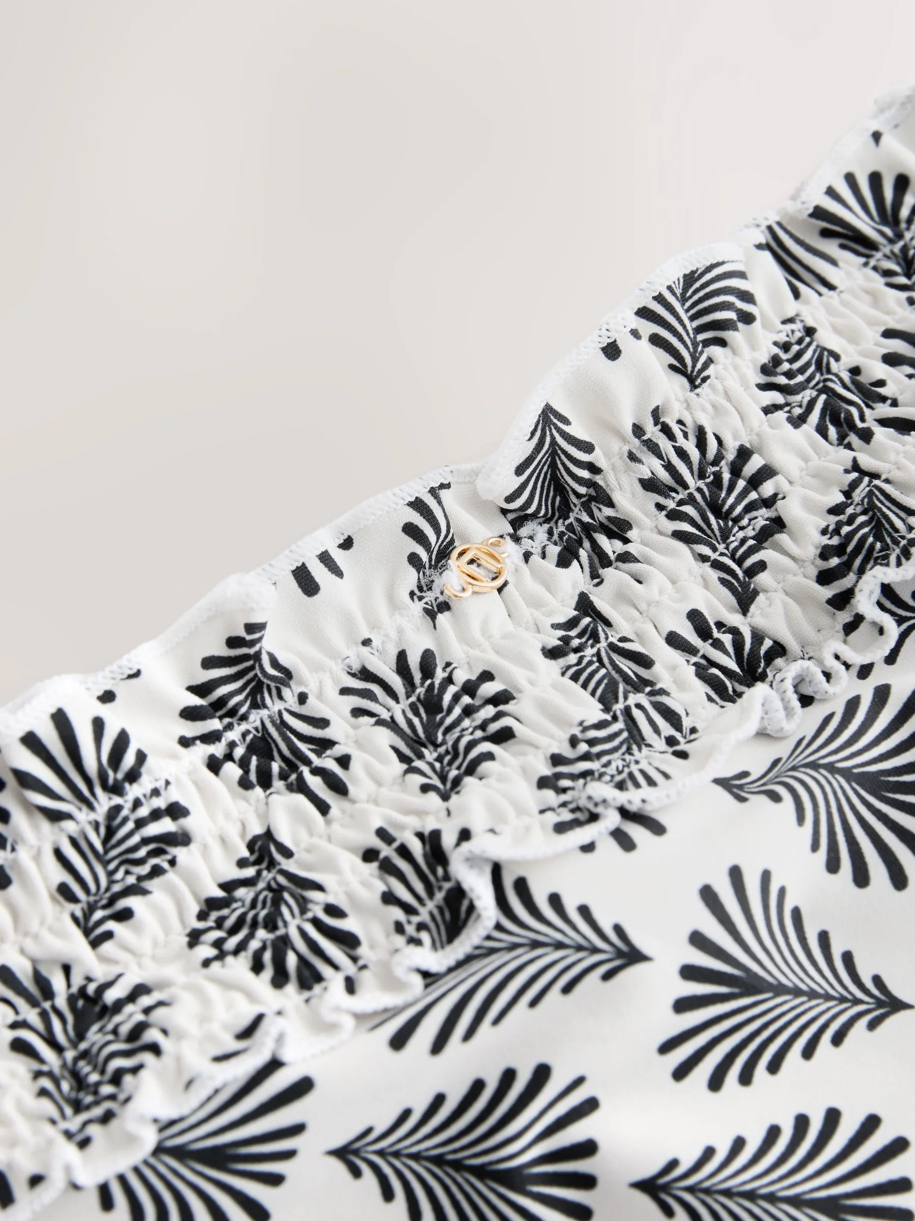 Crème/Zwart Waaierprint - Gerimpelde bikinislip met hoge taille