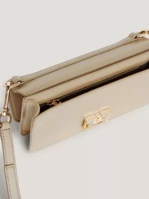 Bolsa transversal pequena de couro com fecho de pressão