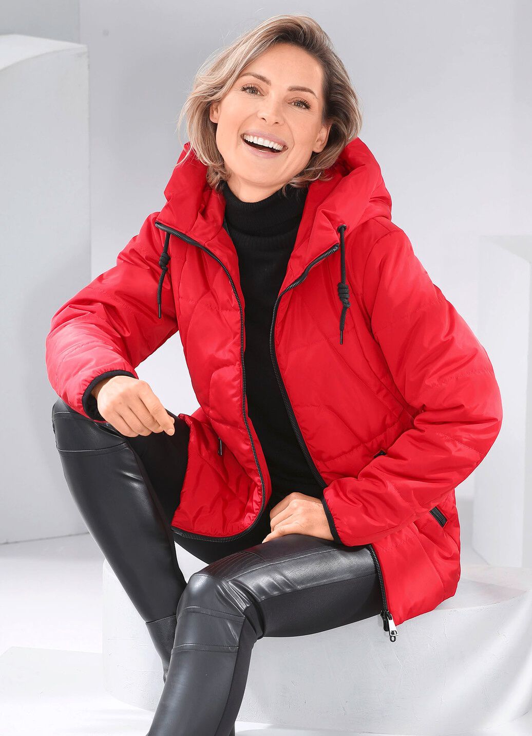 Jacke mit verlängertem Rückteil