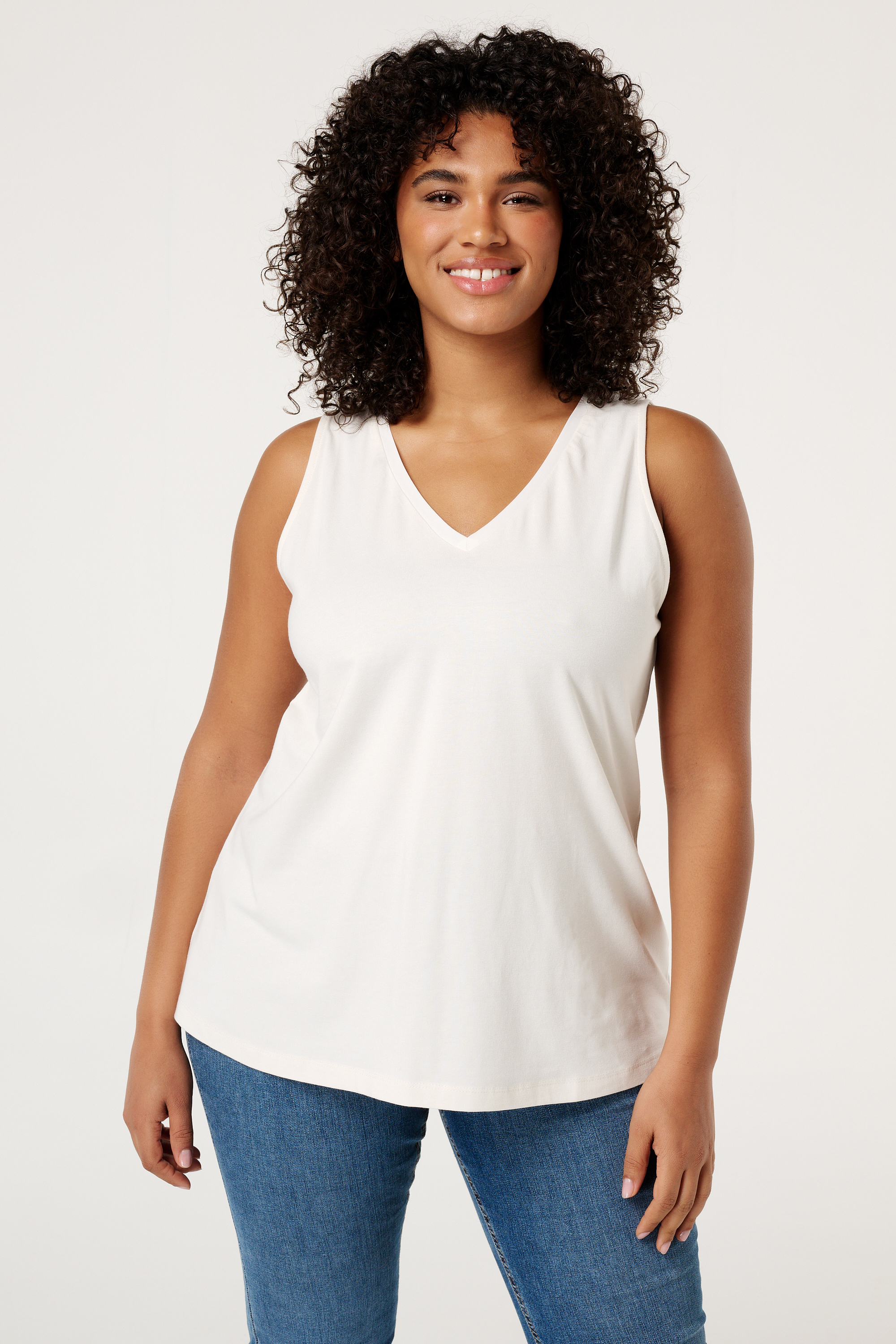 Mouwloze top met V-hals Cream