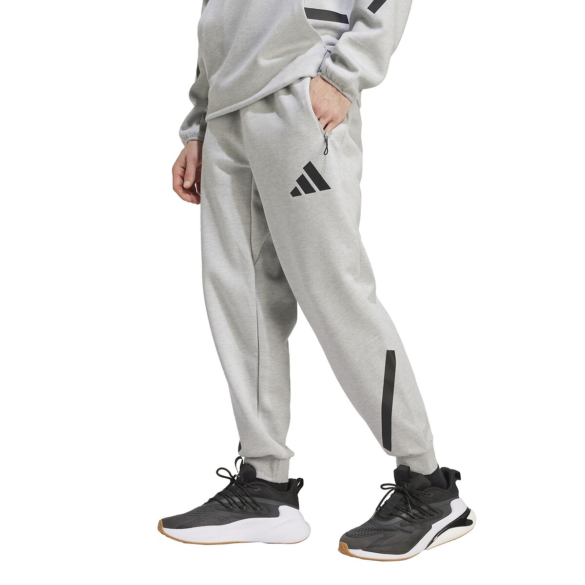ADIDAS ROUPAS ESPORTIVAS<br>Calças de corrida ZN.