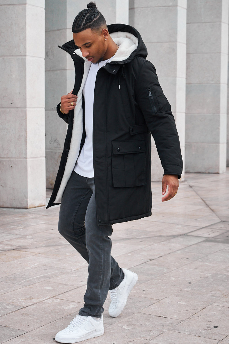 Parka noire à capuche longue à poches