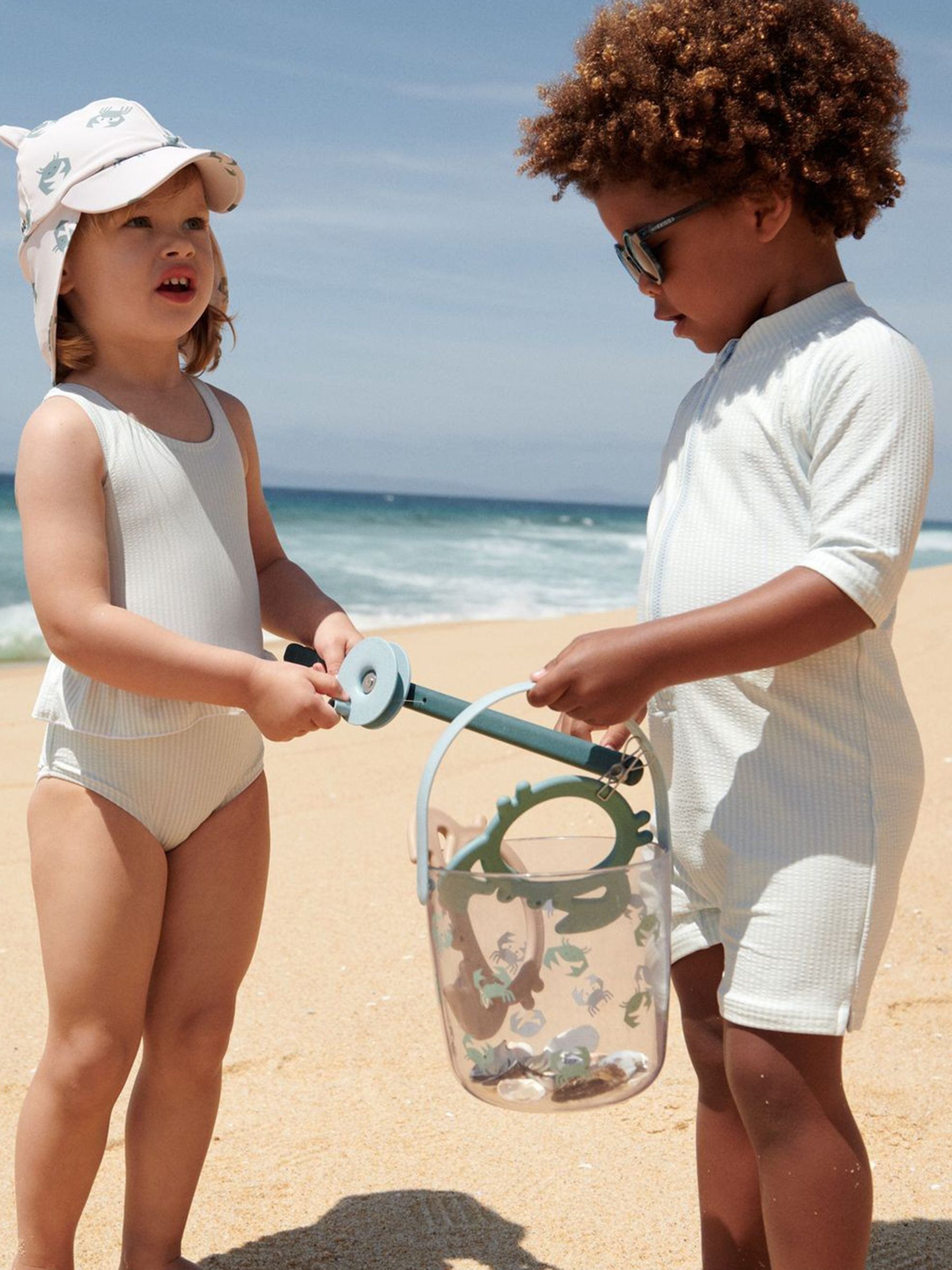 Liewood Blue Max Seersucker Short Sleeve UV Protection Swim Playsuit