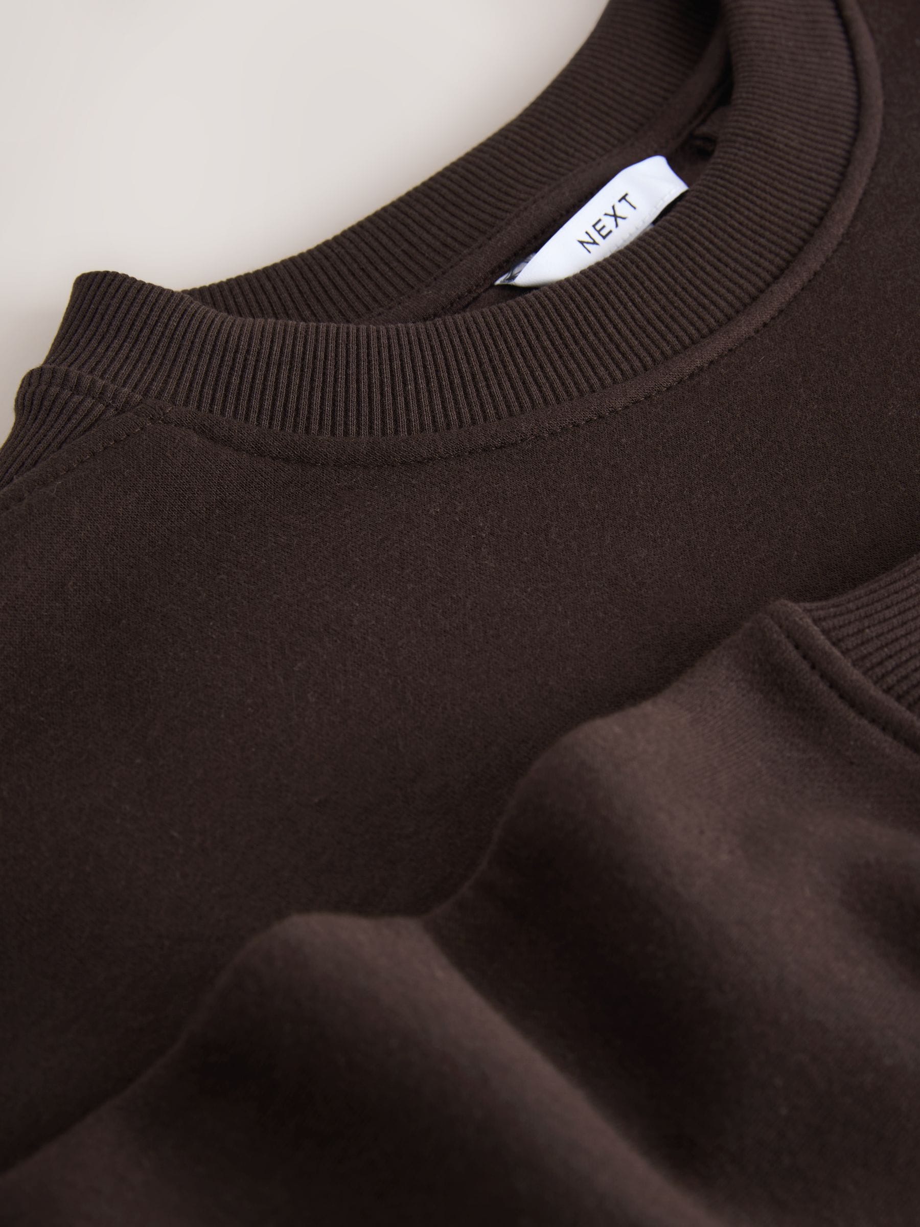 Chocoladebruin - Essentials sweatshirt met relaxte pasvorm, lange snit en zakken