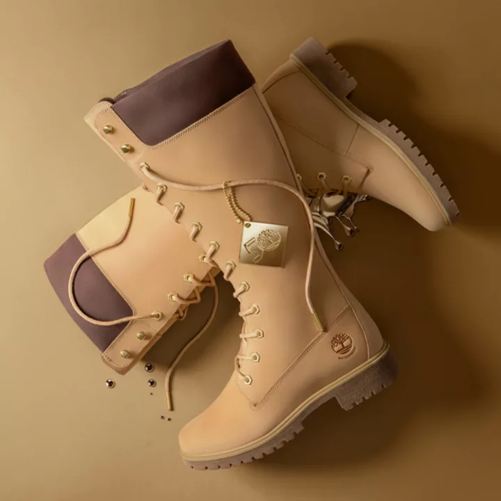 Bota Timberland Butters 50th Edition de 14 polegadas impermeável para mulheres na cor Golden Butter.