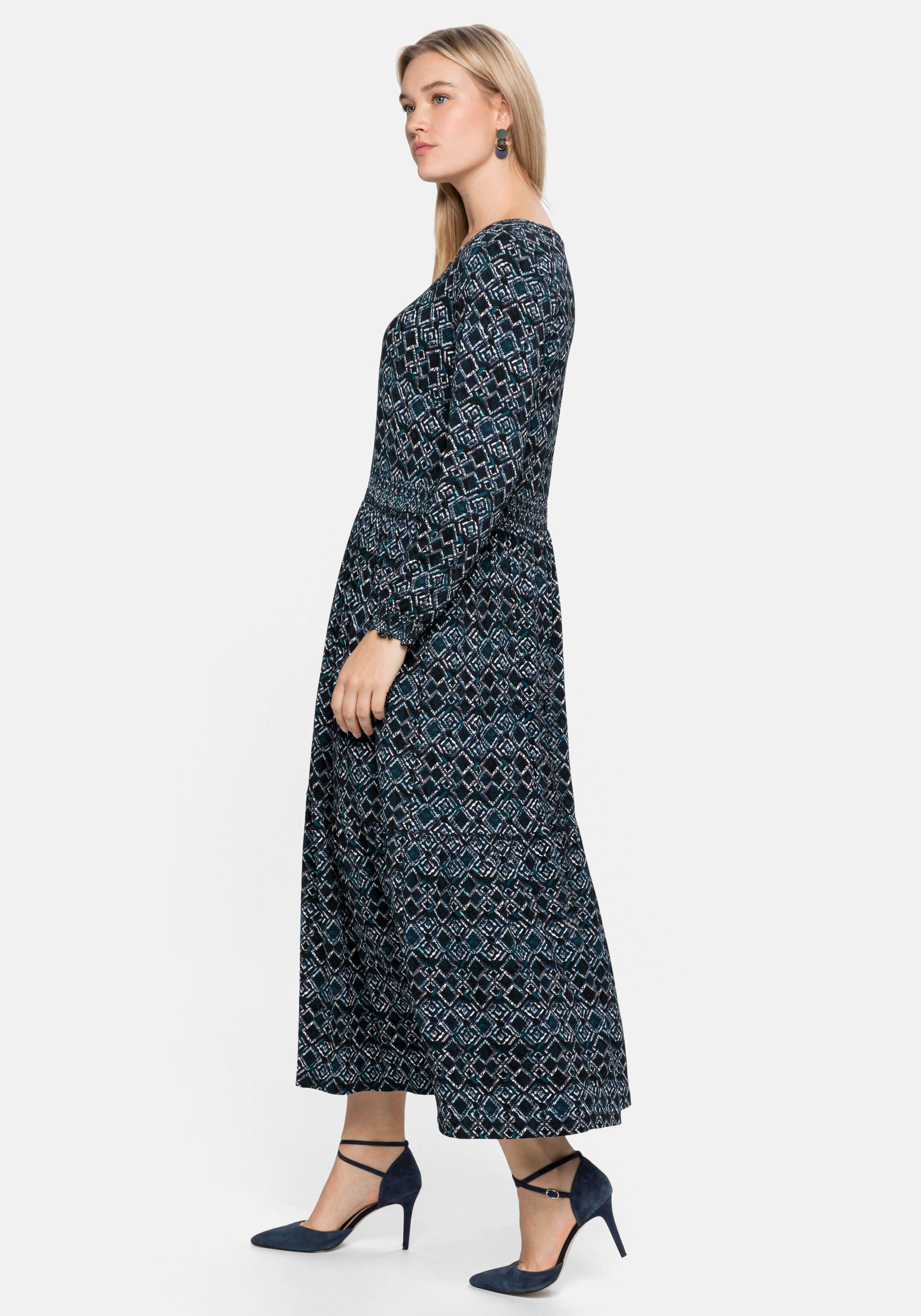 Jerseykleid mit Alloverdruck und Smokdetails