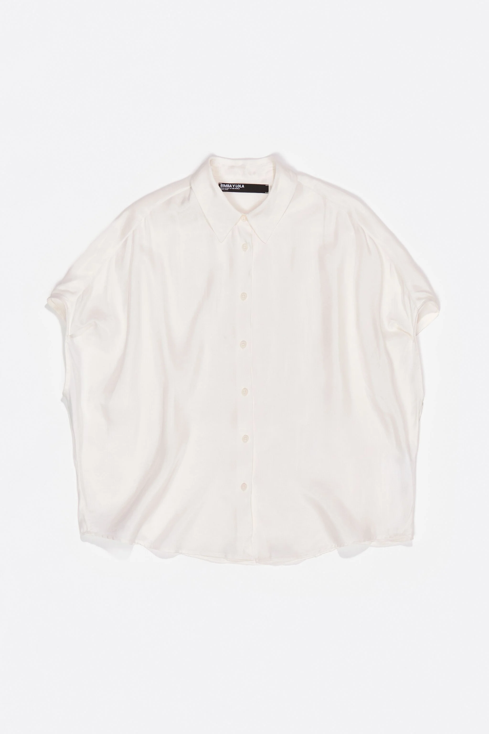 Camisa capa fluida cor marfim