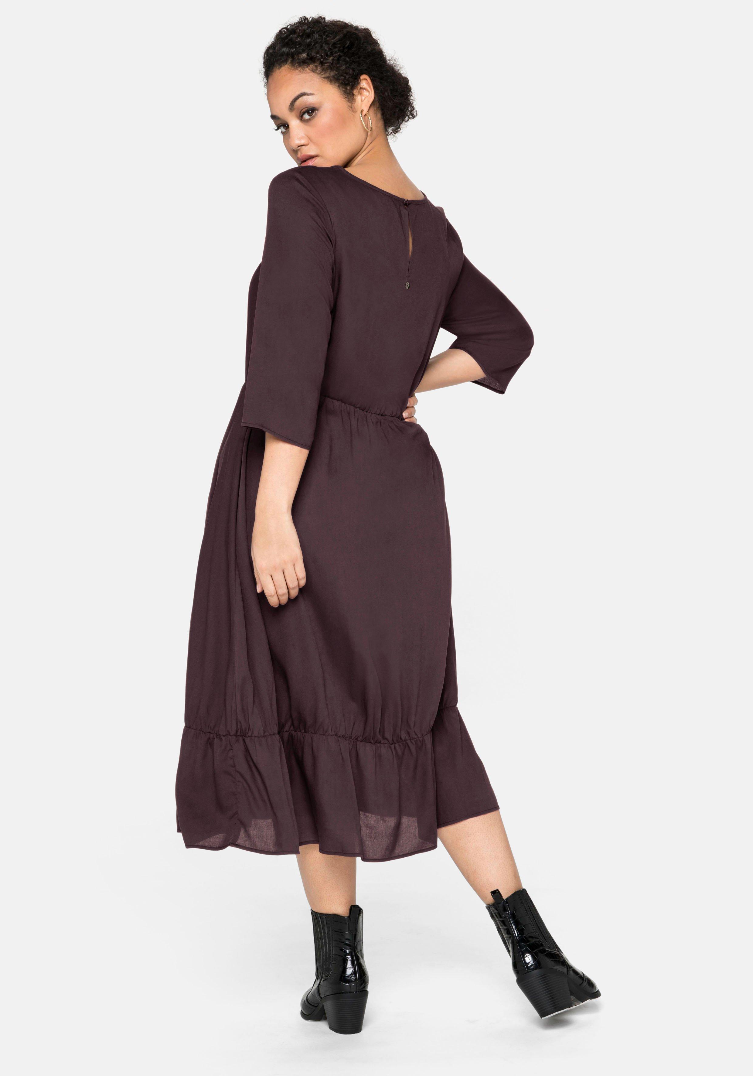 Kleid mit 3/4-Ärmel und Volant am Saum