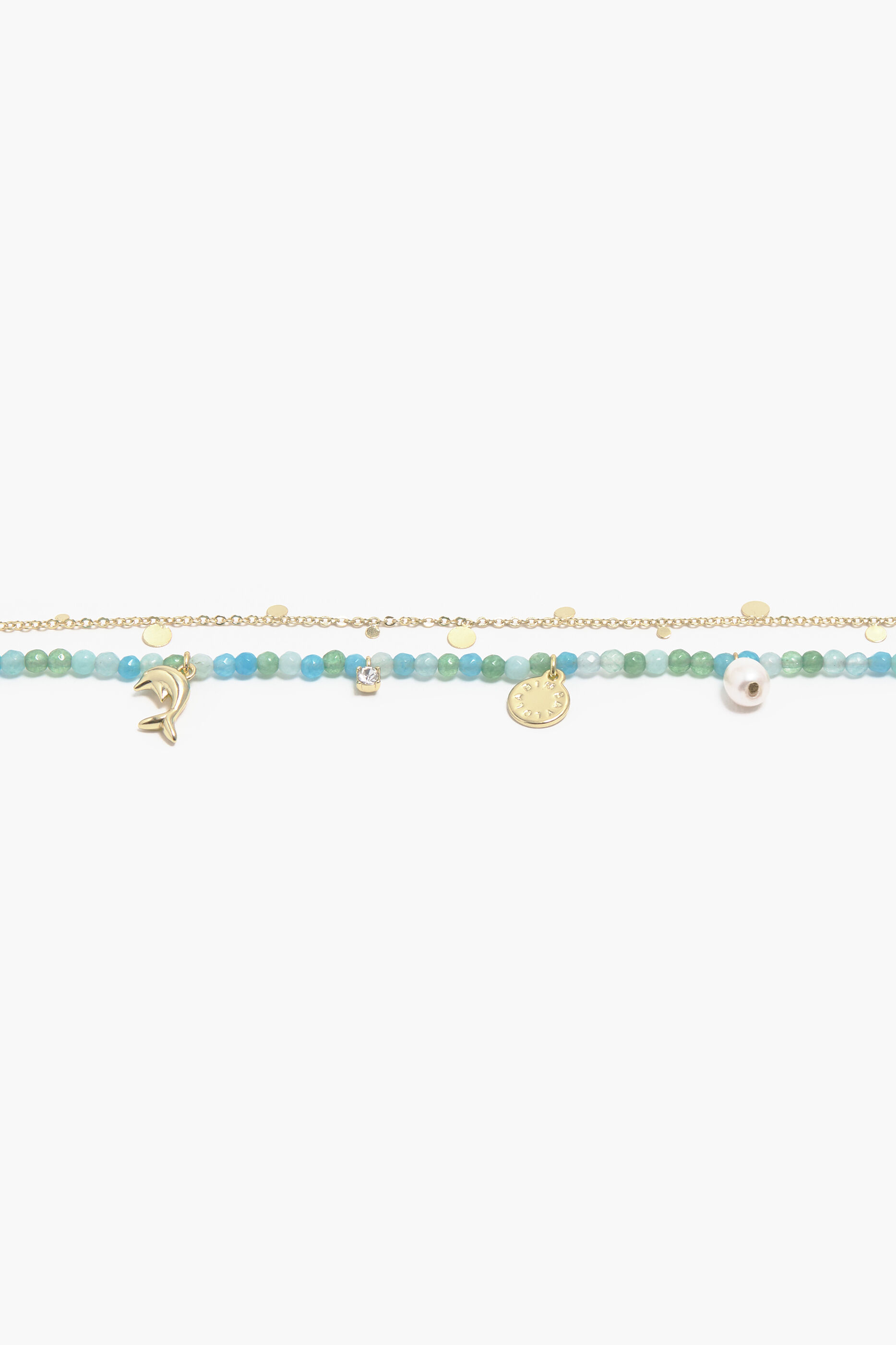 Colar curto com pingente de golfinho e pedras turquesa.