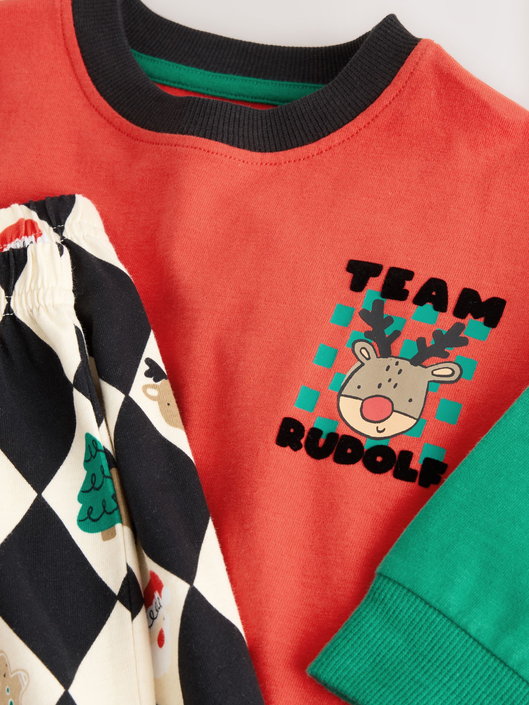 Rood/groen Harlequin - Enkele kerstpyjama (9mnd-12jr)