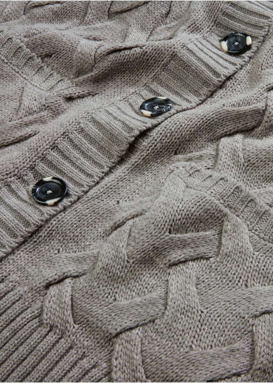 Gilet en maille à col châle et motif torsadé