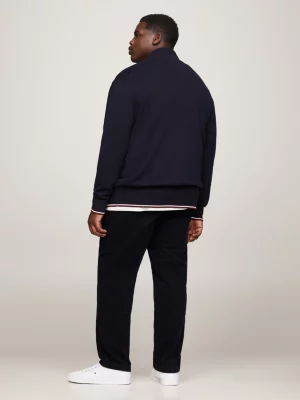 Blusa Plus Global Stripe Hilfiger Monotype com zíper e modelagem relaxada.