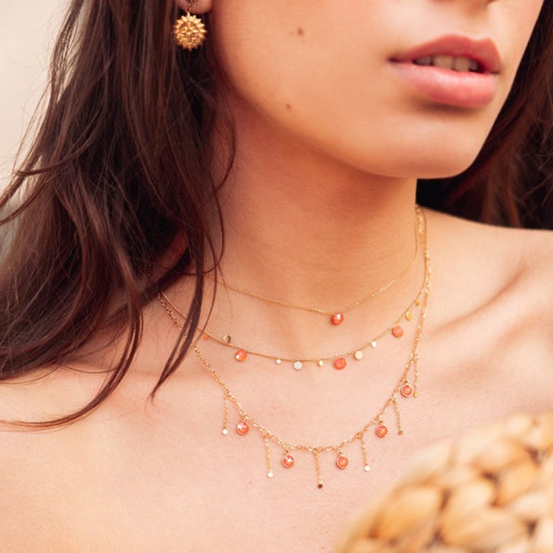 Collier en acier doré avec cristaux orange