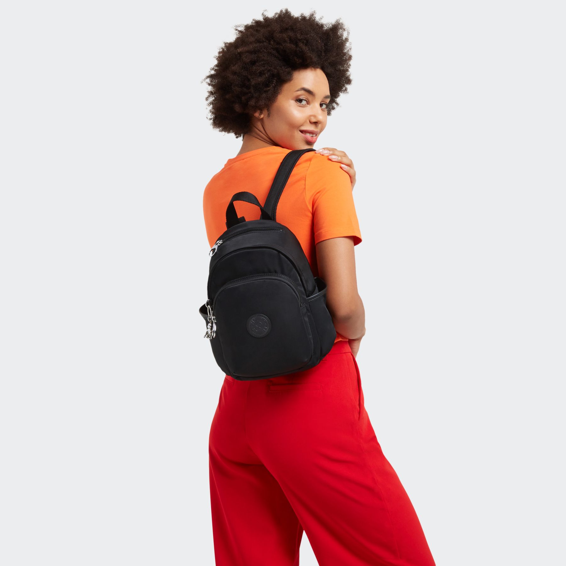 DELIA MINI Petit Sac à Dos avec Poche Frontale et Poignée Supérieure - Paka Black C