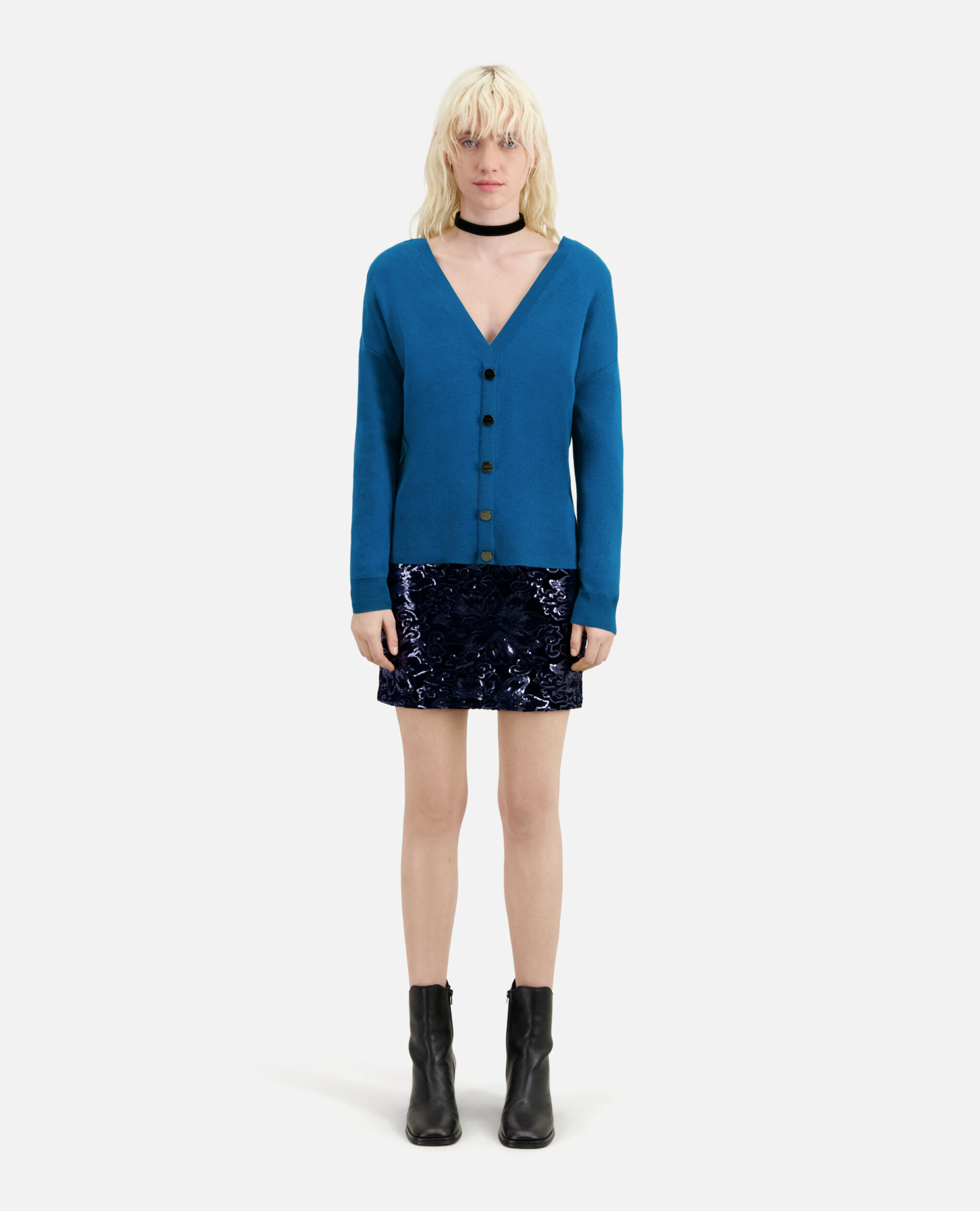 Blue sweater with buttoning on the back