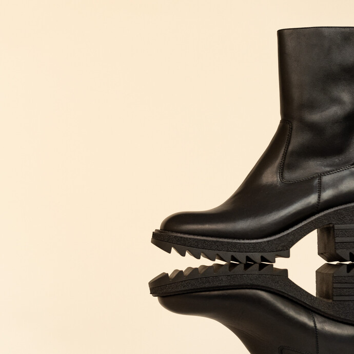 Boots à talons et semelles crantées  en cuir noir