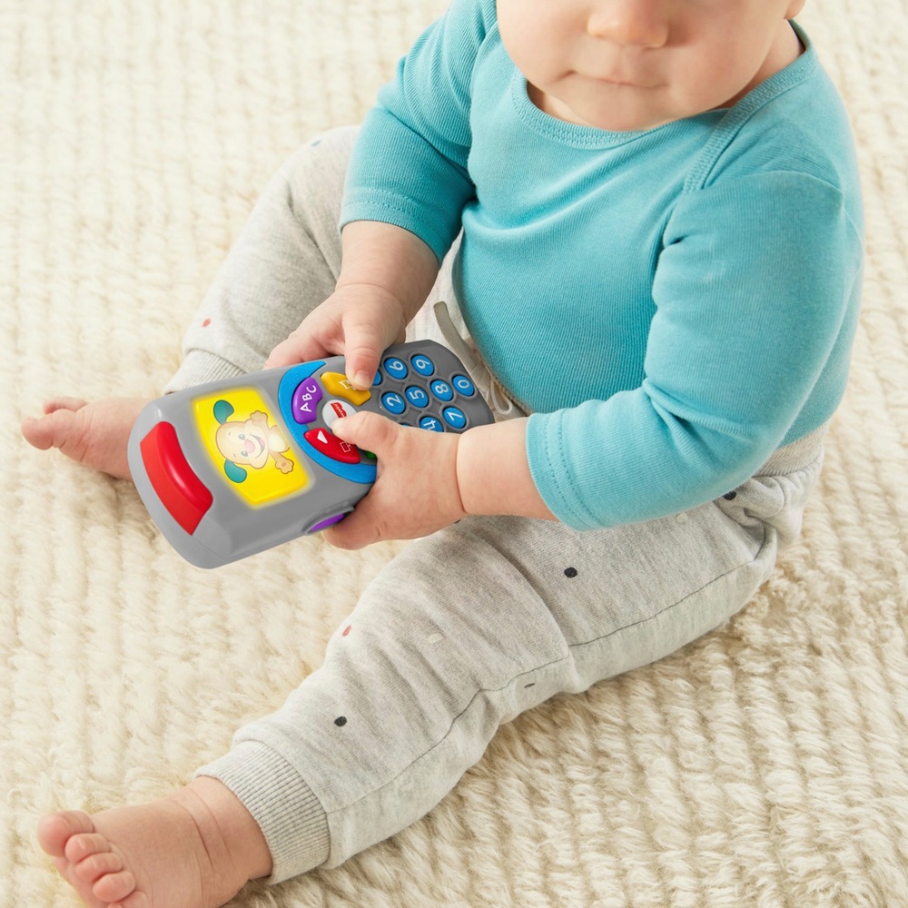 Fisher-Price Lachen & Lernen Welpen-Fernbedienungs-Musikspielzeug