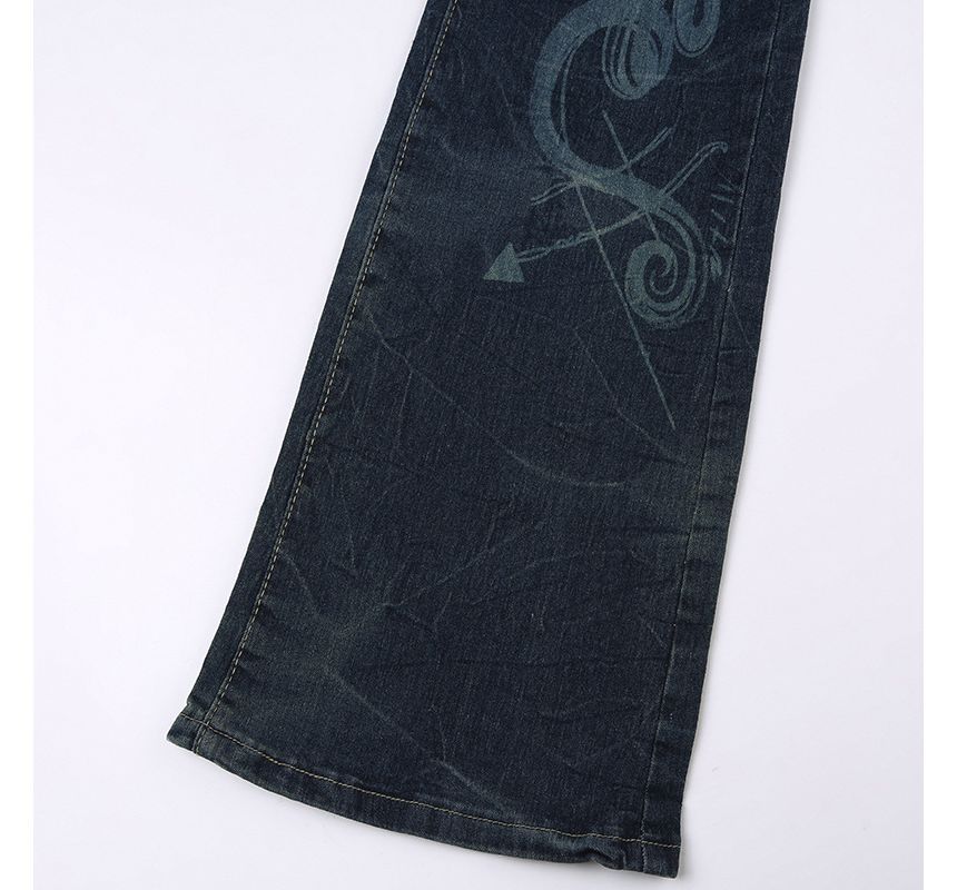 Puffie - Lage taille, gewassen bootcut jeans met pijlprint
