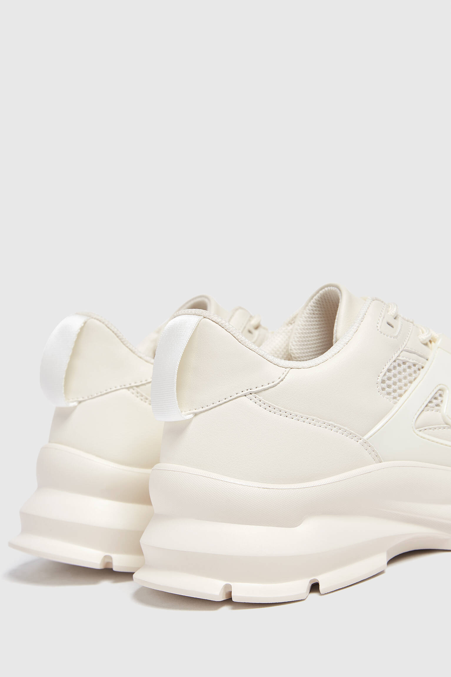TÊNIS ESPORTIVO VOLUME - BRANCO