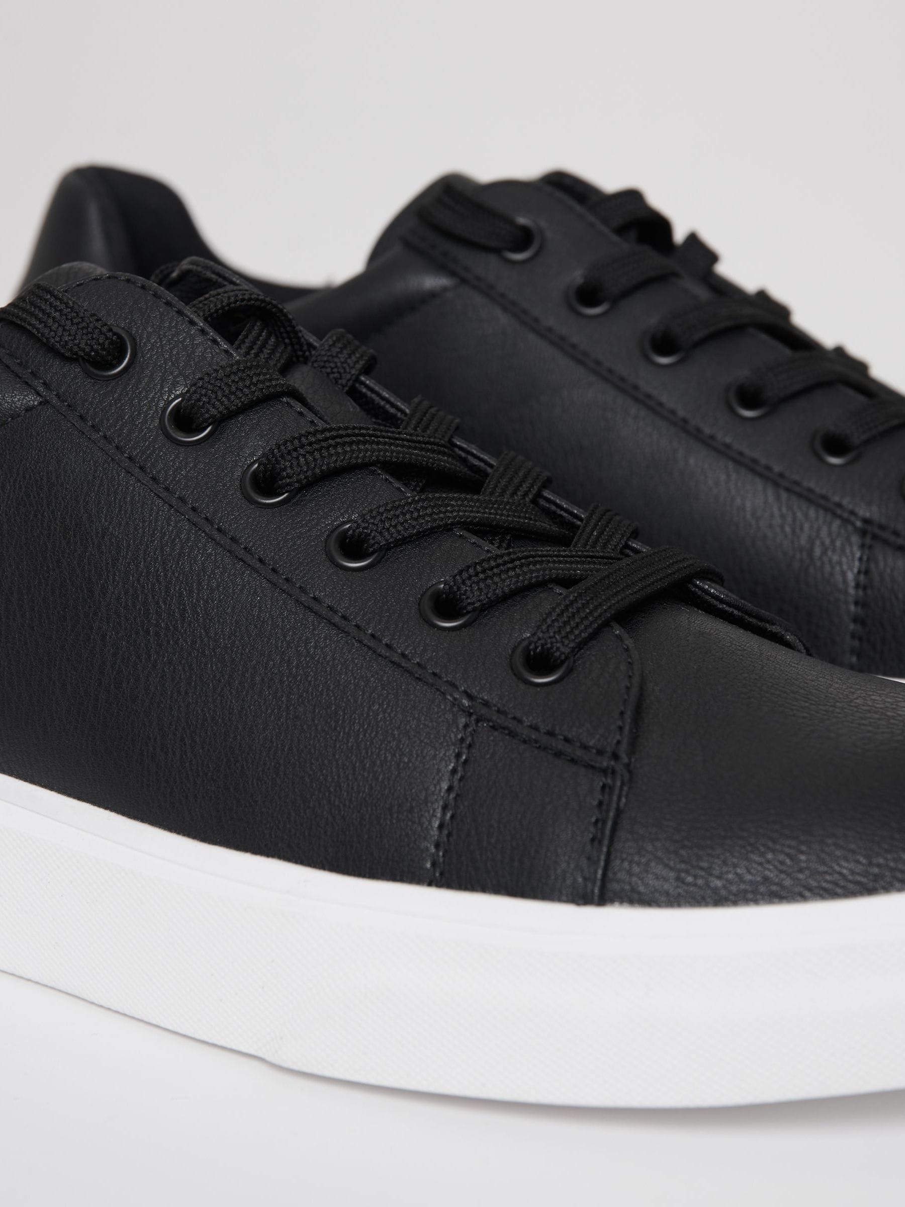 Threadbare Court Trainers
