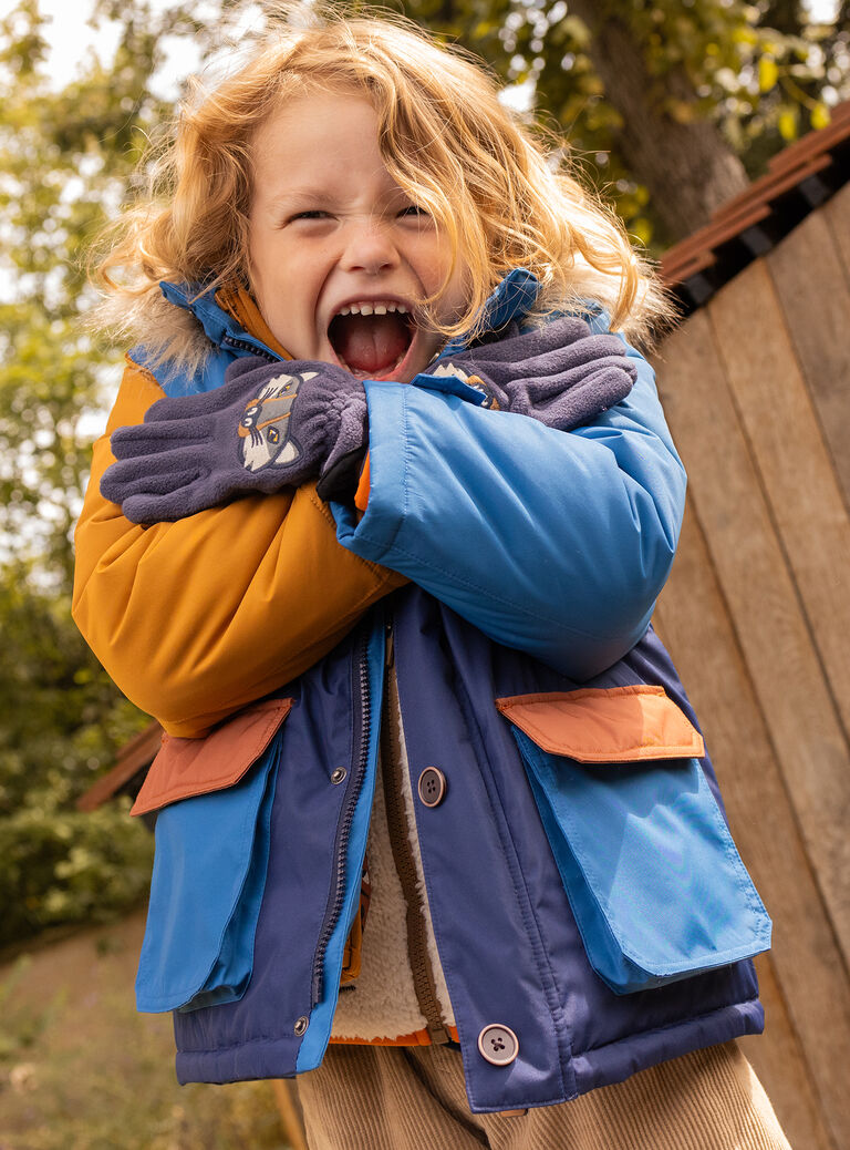 Parka à capuche orange et bleu