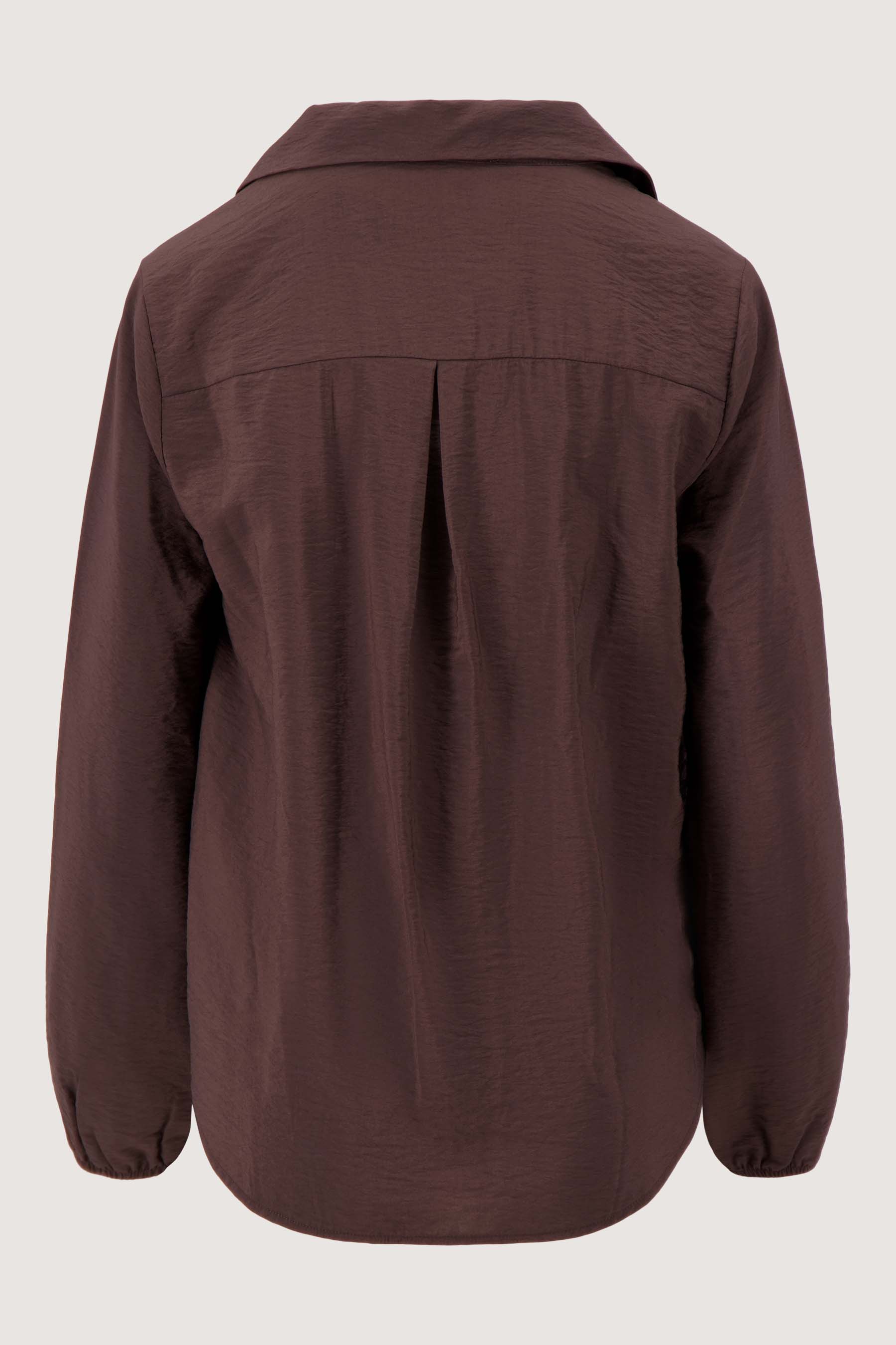 vastgestikte overslag blouse