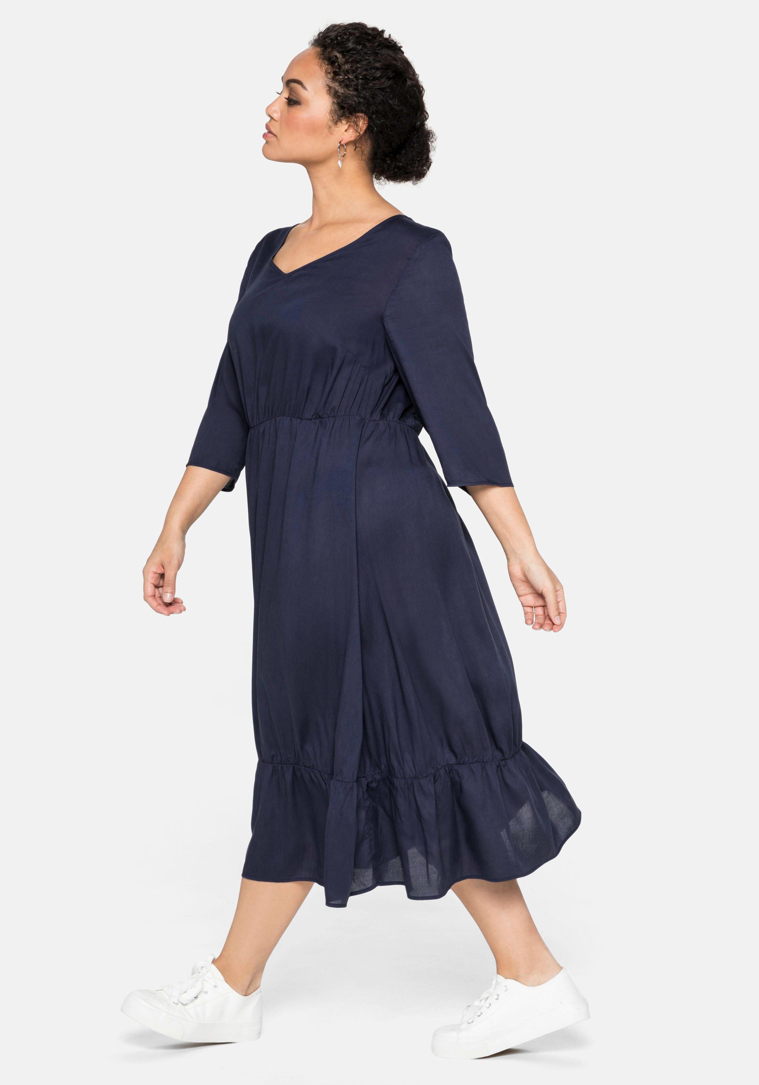 Kleid mit 3/4-Ärmel und Volant am Saum