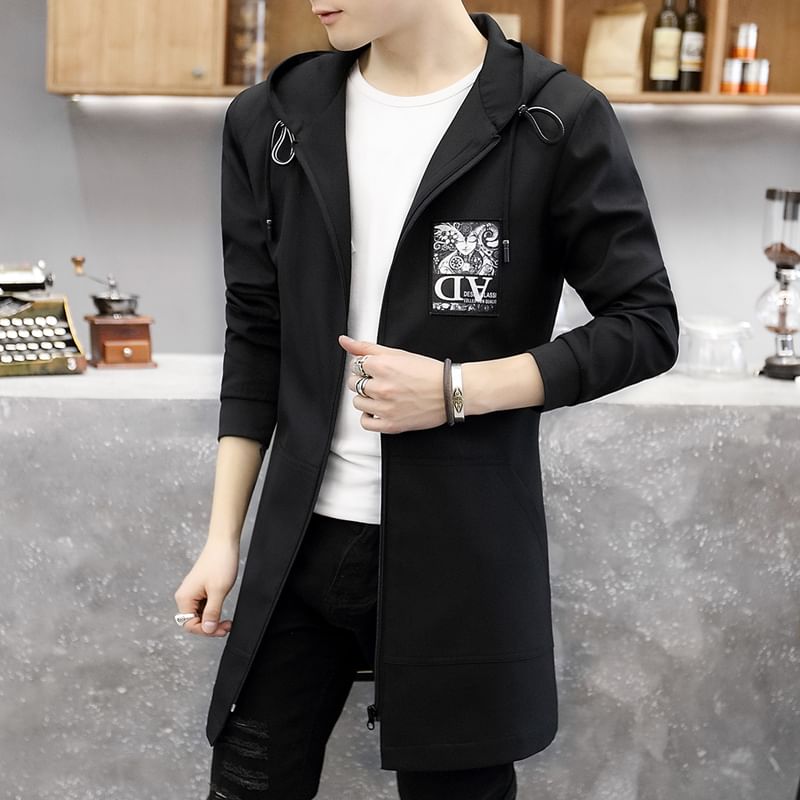 Bay Go Mall - Lange trenchcoat met applicatie en capuchon en rits