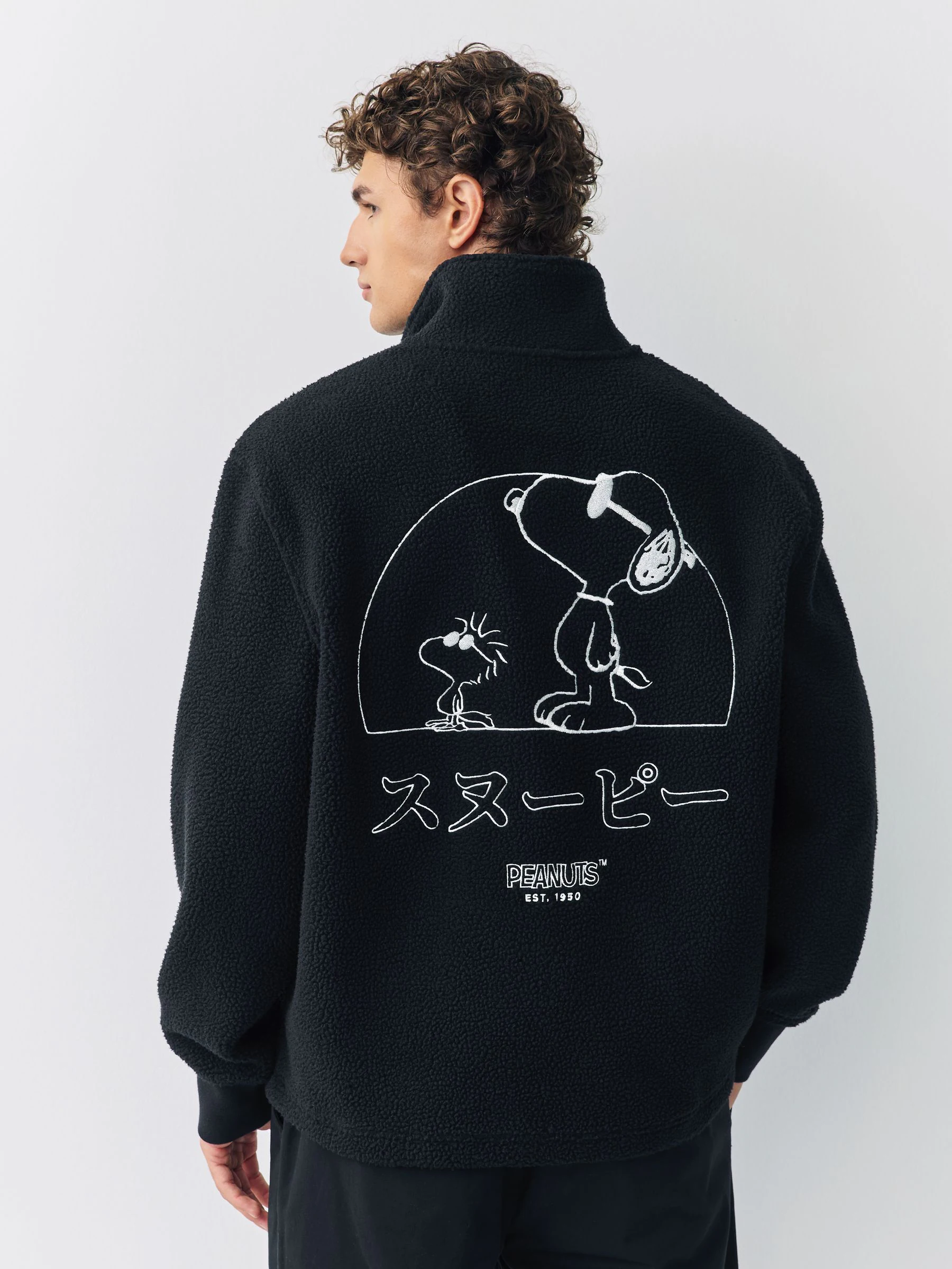 Zwart - Snoopy fleece met korte rits en licentieprint op de achterkant