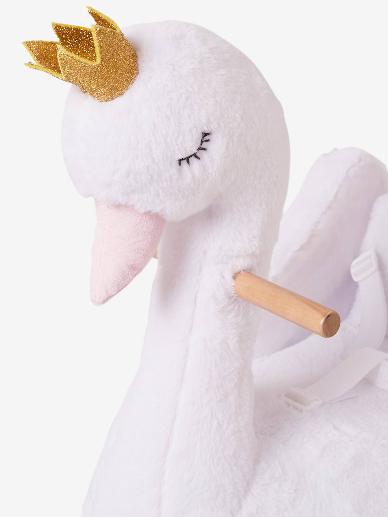 Cisne branco bebê balançando em um balanço