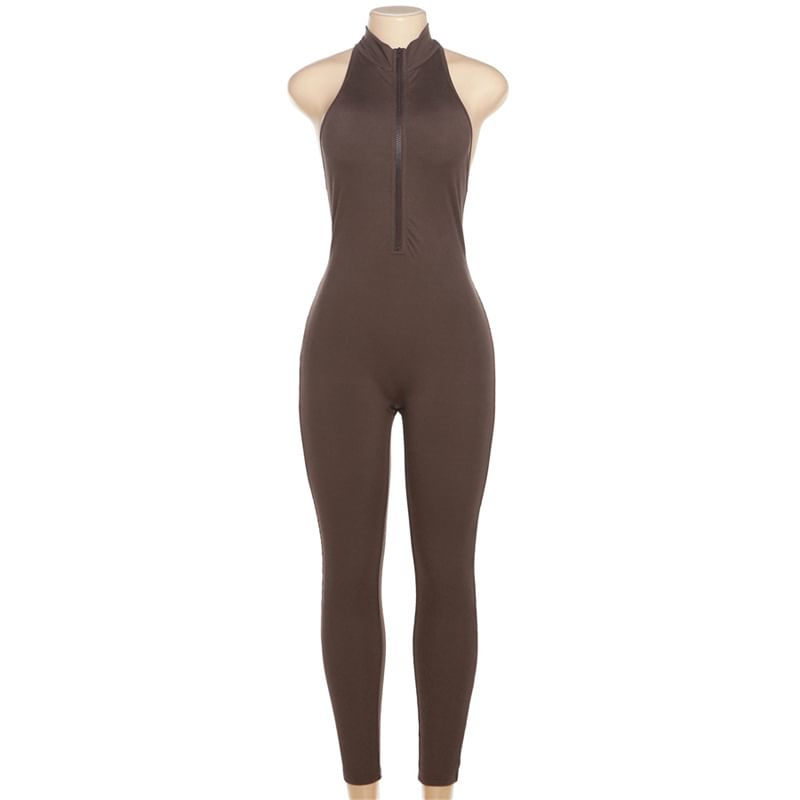 Oonnukal - Halterhals, effen geribbelde skinny jumpsuit met halve rits en open rug