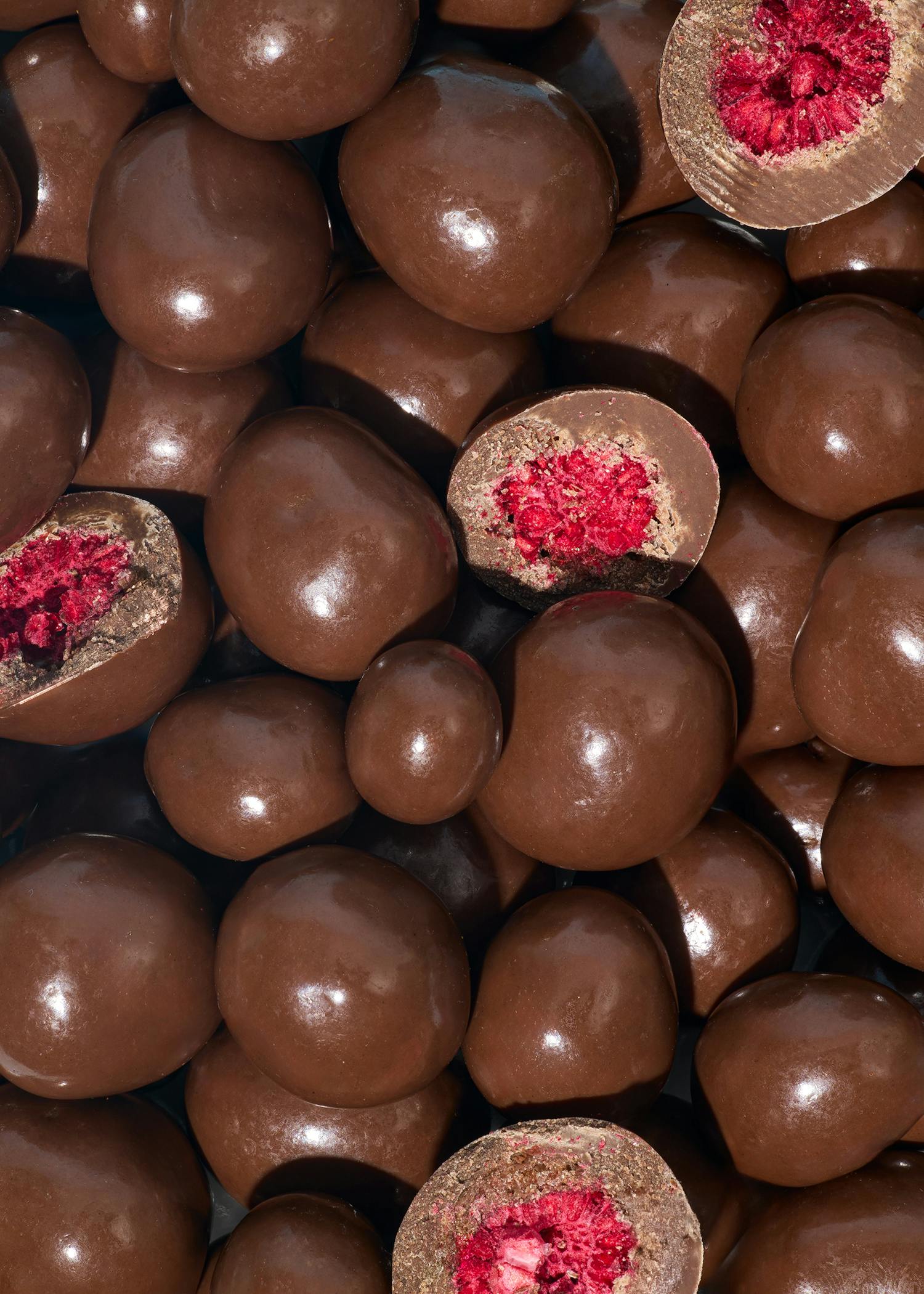 Gefriergetrocknete Himbeeren in Milchschokolade 1 kg