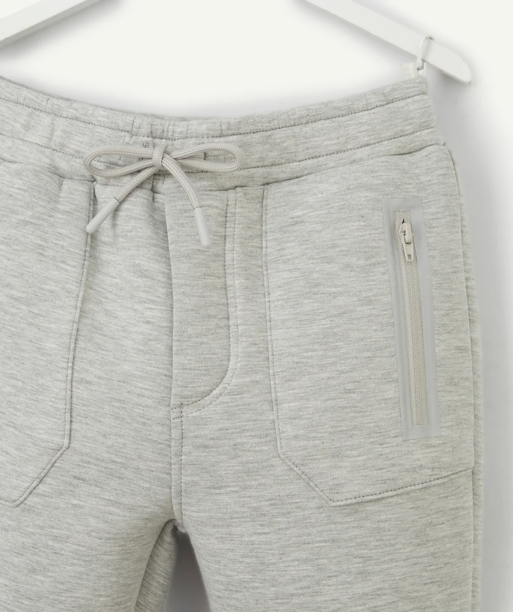JOGGING GARÇON GRIS AVEC DÉTAILS RÉFLÉCHISSANTS