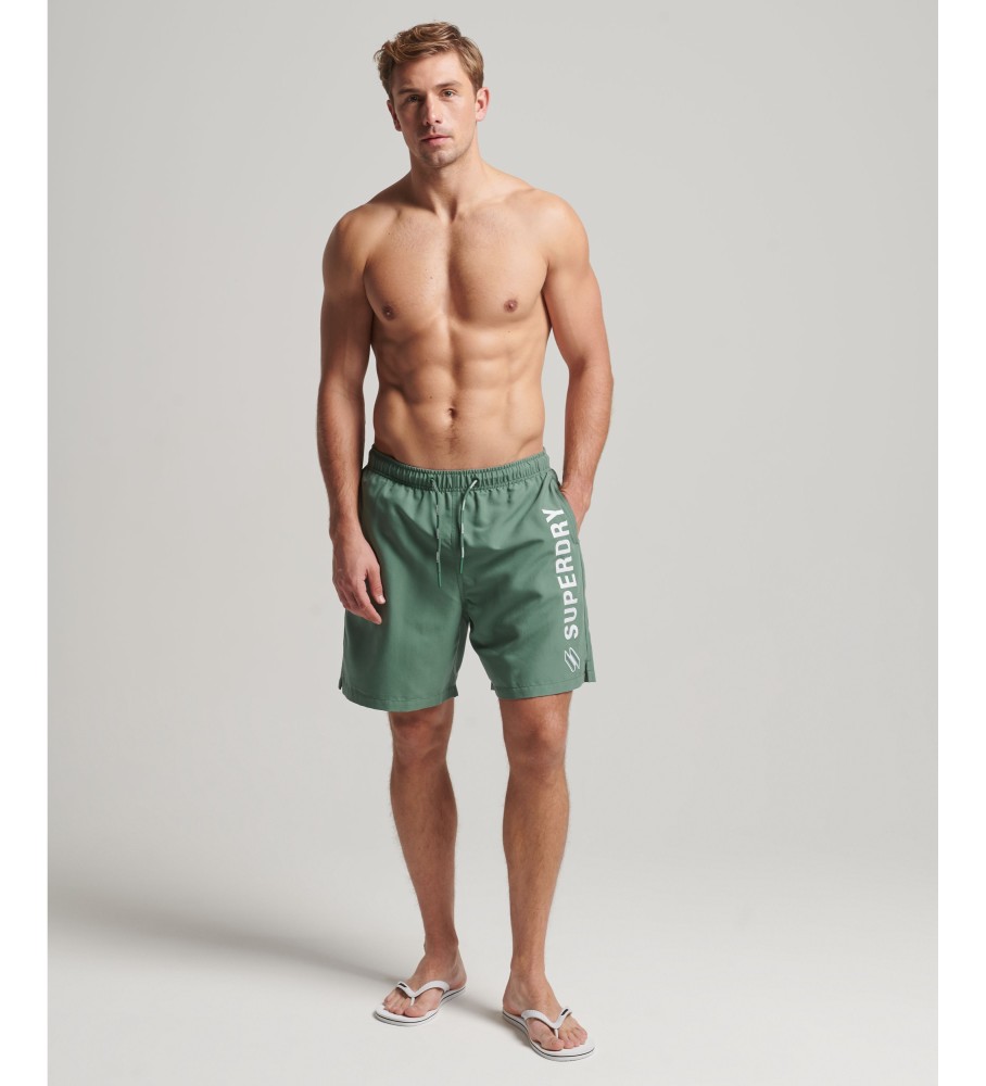 Maiô Superdry tamanho 48cm com apliques, confeccionado em material reciclado ecológico.