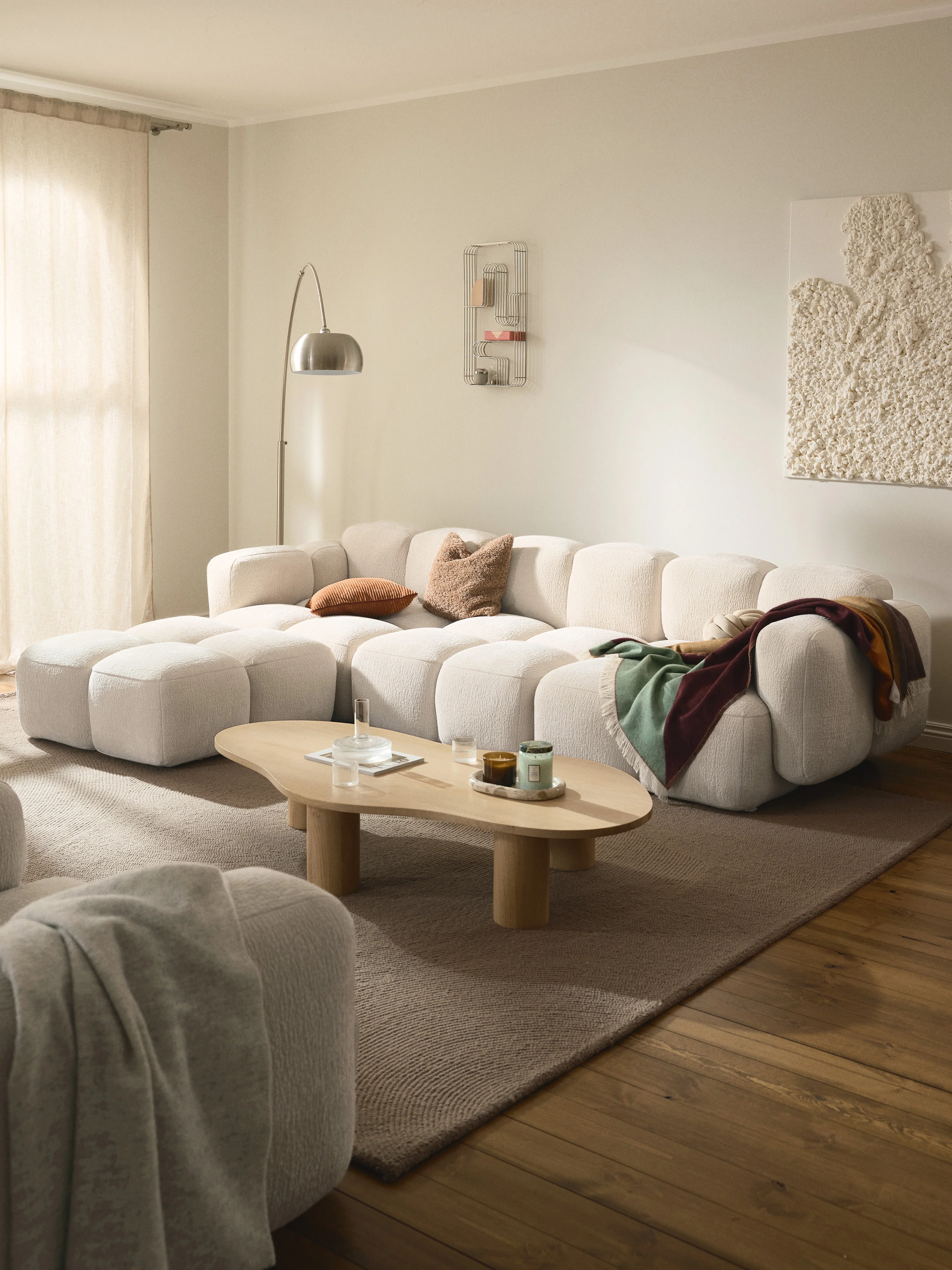 Modulaire bank Tayla (4-zits) met poef (links/rechts)