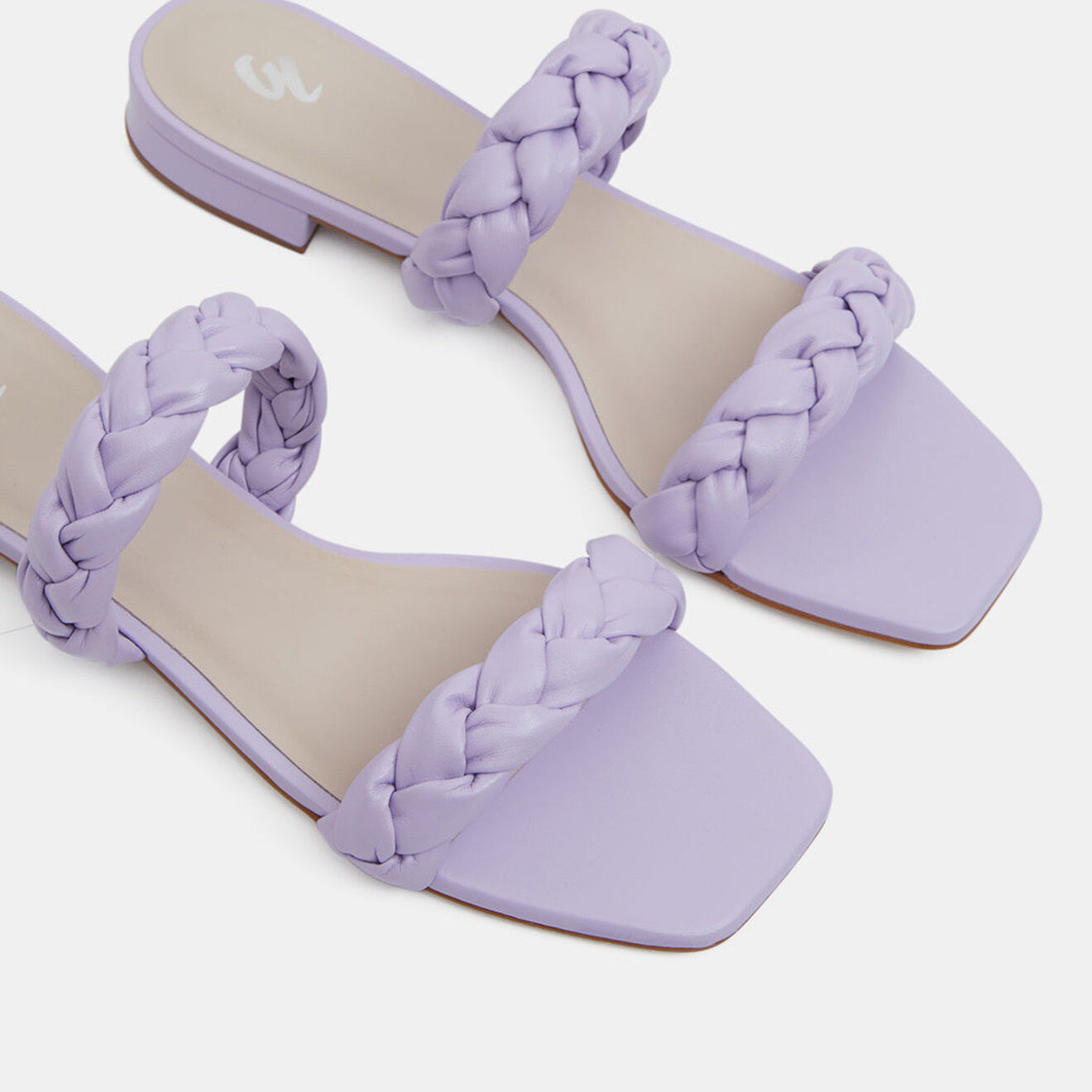 Galeries Lafayette Mules plates en Cuir brides tressées violet clair