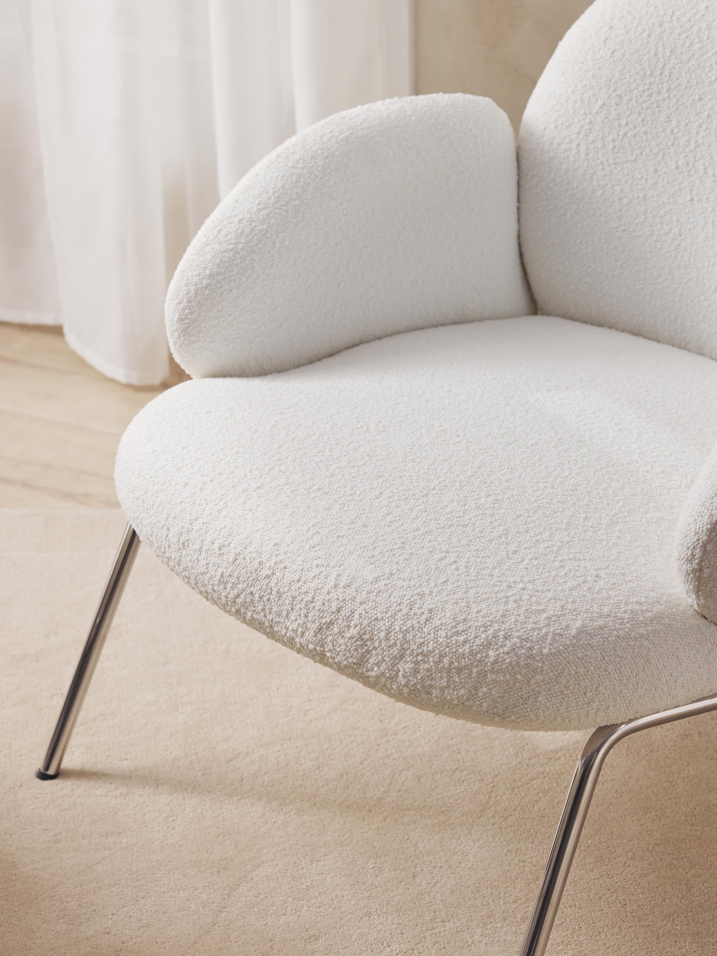 Bouclé fauteuil Luan met metalen poten