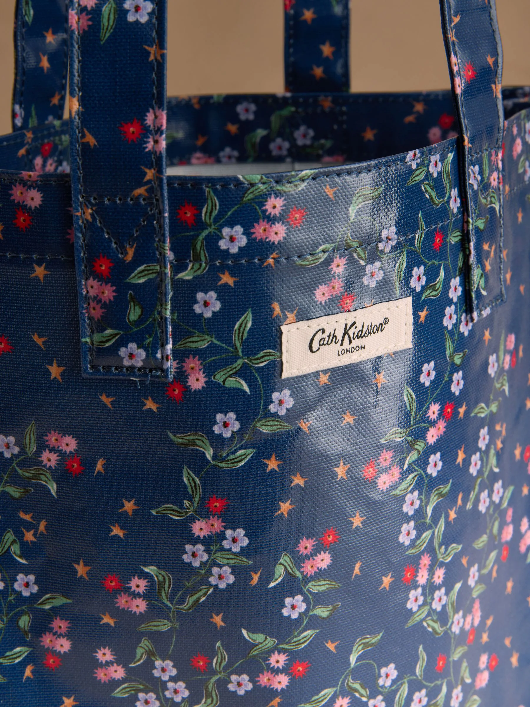 Marineblauwe ster met lenteprint - Cath Kidston grote boekentas