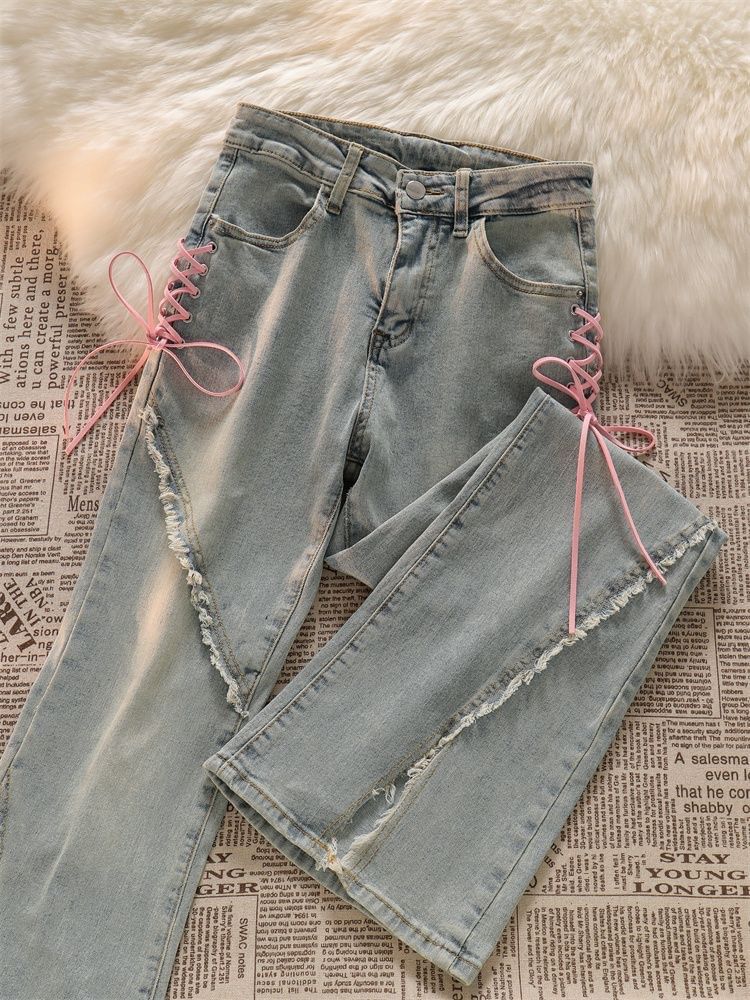 deersweeti - Gestreepte bootcut jeans met vetersluiting en split
