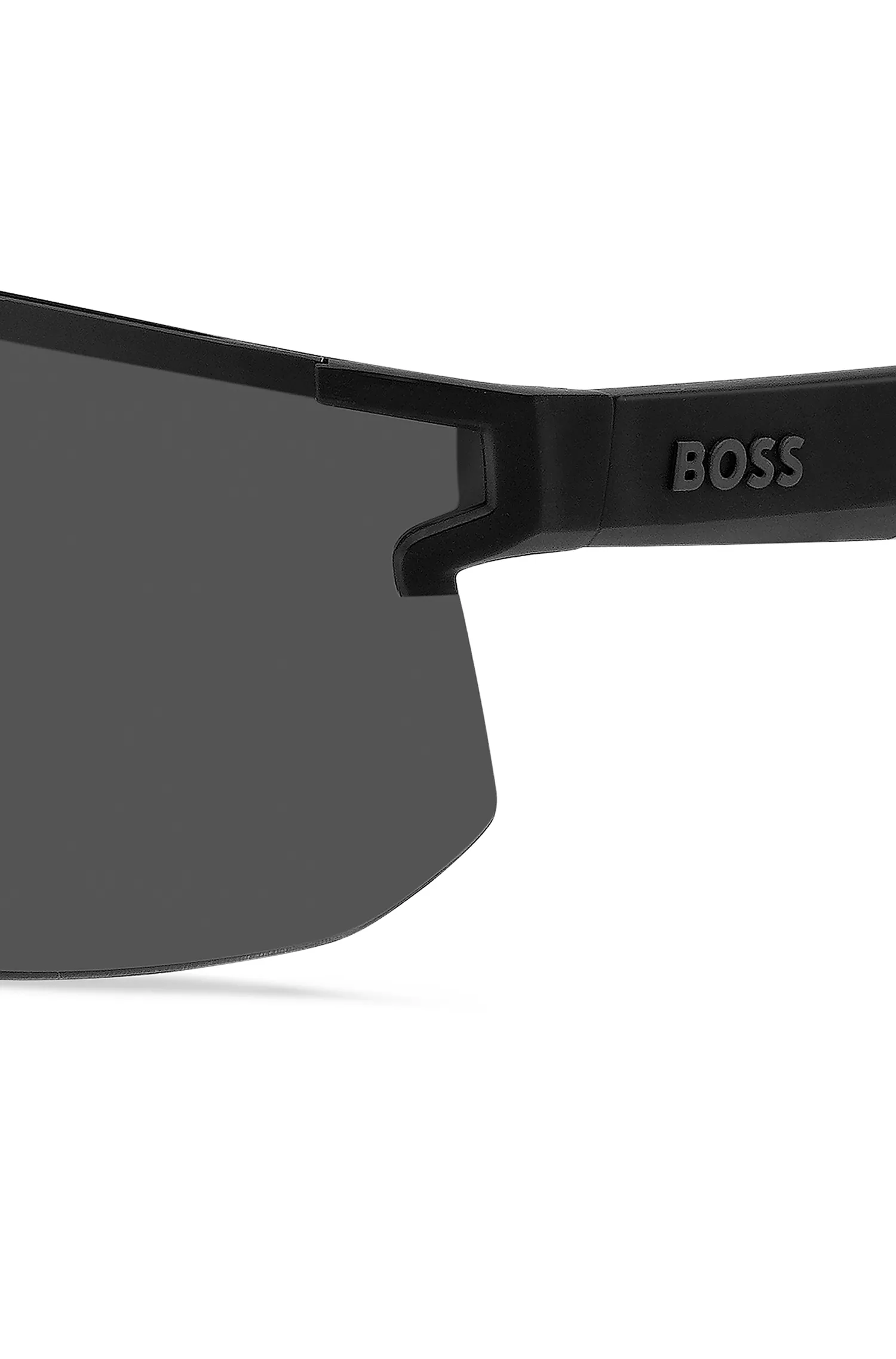 Óculos de sol BOSS pretos, estilo máscara, com hastes e ponte personalizadas com a marca.