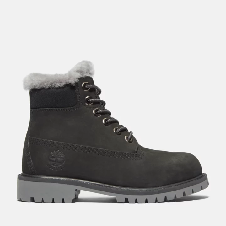 Bota de inverno Timberland Premium de 6 polegadas para jovens, na cor preta.