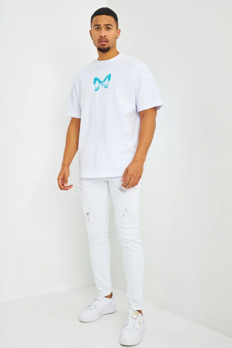 T-shirt blanc oversize papillons bleus
